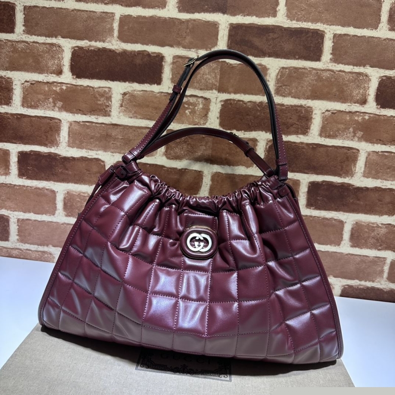G*u*i top handle bags